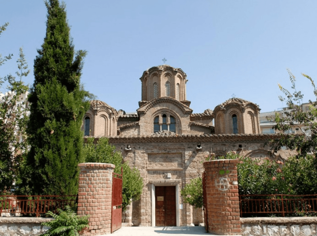 Exterior of the Church of Saint Catherine in Thessaloniki, a Byzantine brick church with multiple domes